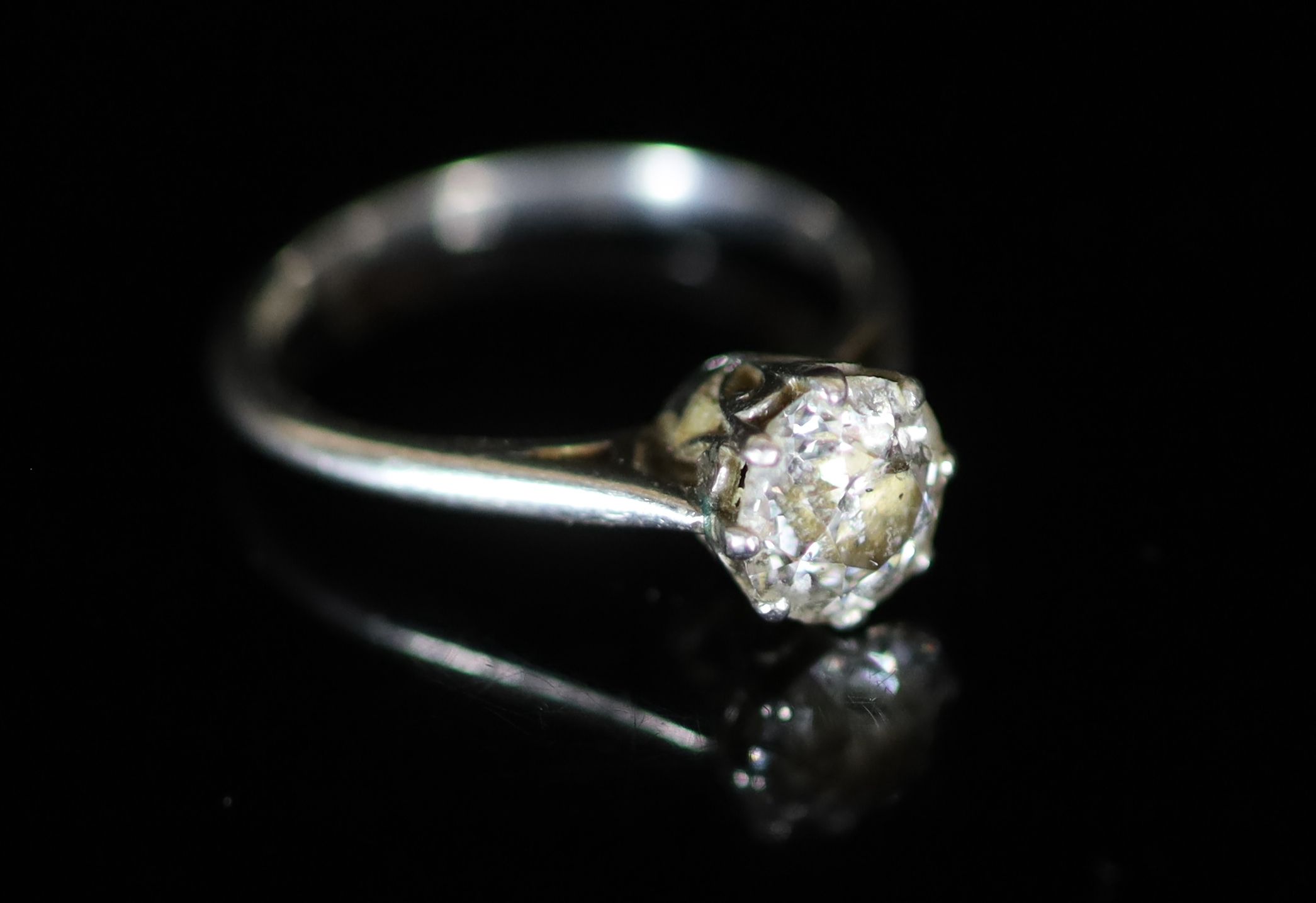 An 18ct white gold and solitaire diamond ring